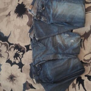 Three pairs of women's Buckle jeans size 30.
